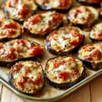 Pizzette di melanzane con pomodorini e mozzarella freschi