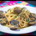 Piatto di spaghetti vongole con cozze fresche e prezzemolo