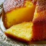 Deliziosa torta sofficissima all'arancia con scorza fresca e succo d'arancia