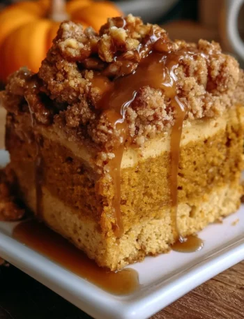 Maple Brown Butter Pumpkin Coffee Cake served on a plate