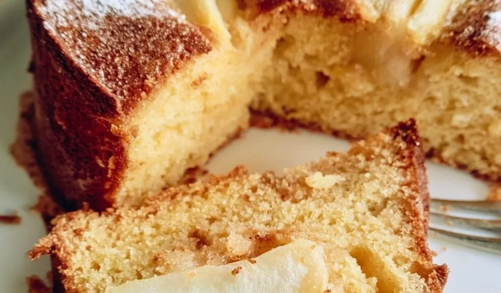 Delicious slice of Quick Pear Cake with fresh pears and spices