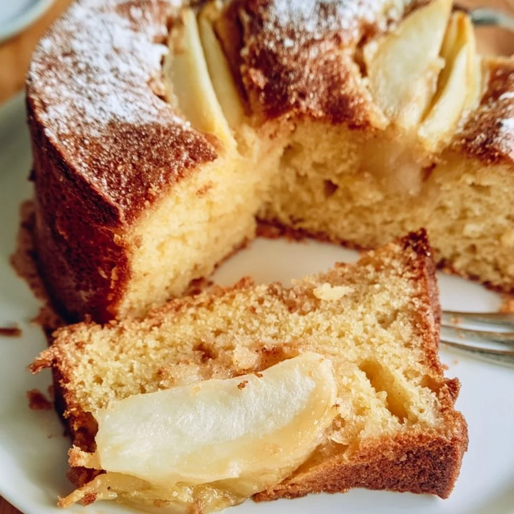 Delicious slice of Quick Pear Cake with fresh pears and spices