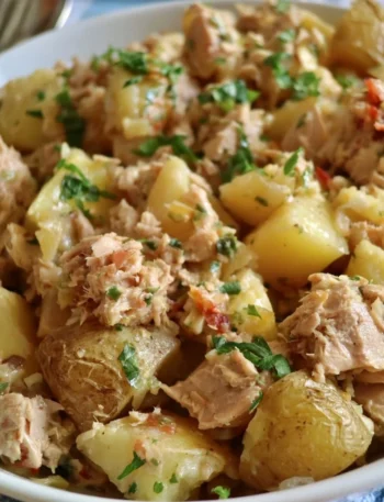 Delicious Tuna Potato dish served on a plate with herbs