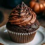 Cupcake cioccolato con decorazione a ragnatela per feste