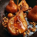 Pere al forno con miele e nocciole appena sfornate